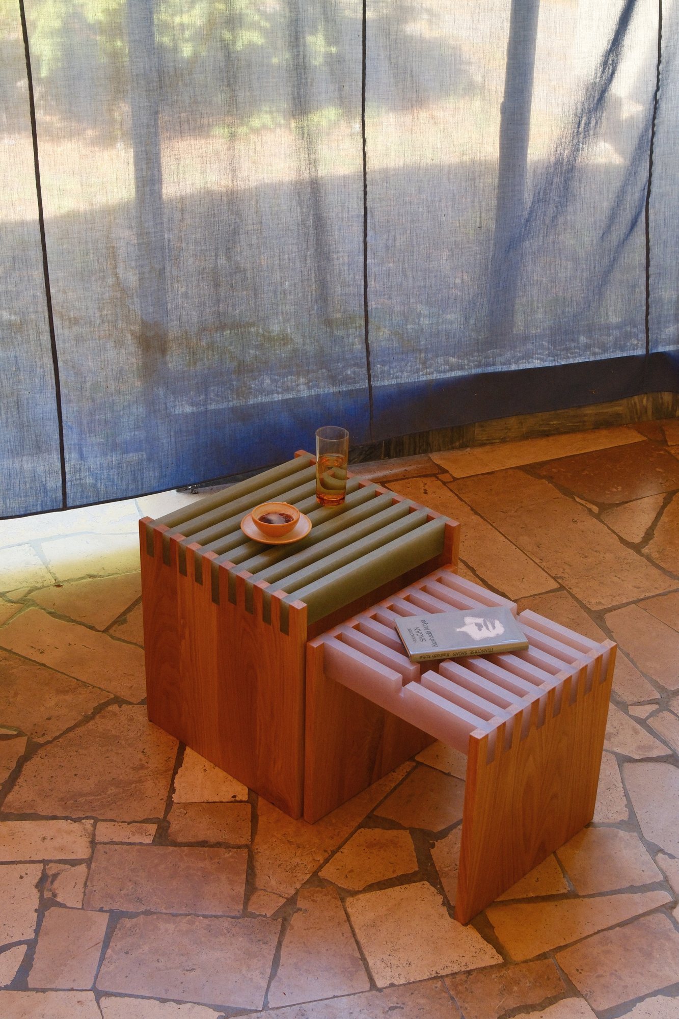 Pair of SML Cubes on a stone floor