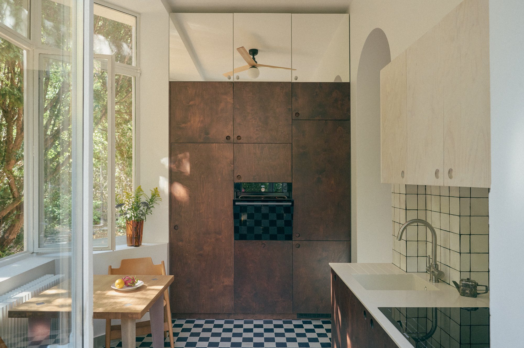 Dark oiled wood kitchen in the B6 apartment